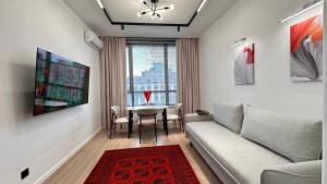 Χώρος καθιστικού στο Khan Shatyr Luxe Apartaments - Breakfast included