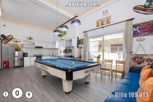a living room with a pool table in it at Biệt thự Bãi Sau Võ Thị Sáu khu Á Châu in Vung Tau