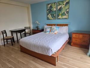 En eller flere senge i et værelse på Inn on the Park #1009