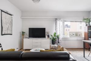 TV a/nebo společenská místnost v ubytování Nordic Green Stay + 21 fotografií