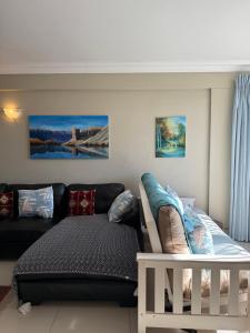 Giường trong phòng chung tại The Ocean Nook - Modern Beach Condo +7 ảnh