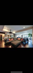 a large living room with couches and a couch at White Rock Joy Inn in White Rock