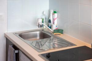 オーディエルヌにあるAppartement duplex vue merのキッチン(シンク付きキッチンカウンター付) +16枚の写真