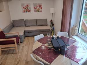 Posezení v ubytování L'Alsace d'ANTAN