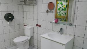 Koupelna v ubytování Mei Hua Hotel