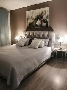 Ένα ή περισσότερα κρεβάτια σε δωμάτιο στο Few Steps to the Bay