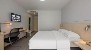 Μια τηλεόραση ή/και κέντρο ψυχαγωγίας στο Jinjiang Inn Pingyao Branch