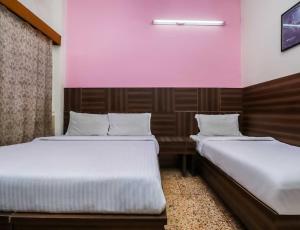 Ένα ή περισσότερα κρεβάτια σε δωμάτιο στο Hotel Vandana - 5 mins away from New Delhi