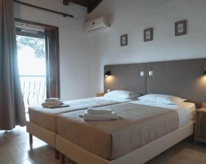 Postel nebo postele na pokoji v ubytování Villa Anna Maria