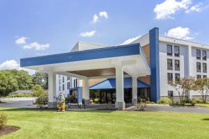 a building with a blue and white building at Hampton Inn New Bern in New Bern