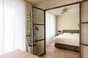 Ένα ή περισσότερα κρεβάτια σε δωμάτιο στο Pievos