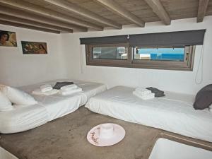 Posezení v ubytování Aegean Aura , Stylish Mykonos Stay + 10 fotografií