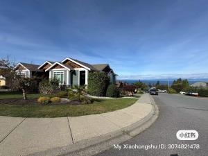 a house on the side of the road at A Room of One's Own-A perfect getaway by the sea in North Nanaimo in Nanaimo