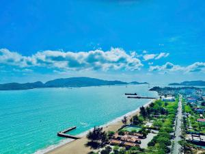 a view of a beach with houses and the ocean at Imperial Nha Trang in Nha Trang