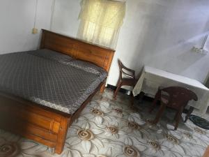 Ένα ή περισσότερα κρεβάτια σε δωμάτιο στο Delft Aquatic Tourist Hotel