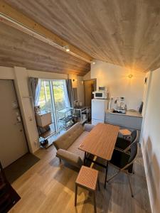 Kuchyň nebo kuchyňský kout v ubytování グランピーナアウトドアーズマキノ