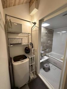 Koupelna v ubytování グランピーナアウトドアーズマキノ