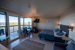 Postel nebo postele na pokoji v ubytování Timantti B6