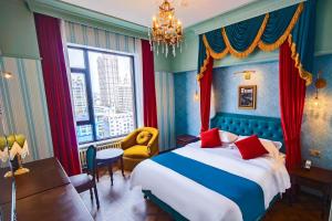 Postel nebo postele na pokoji v ubytování Friendship Hotel, Manzhouli