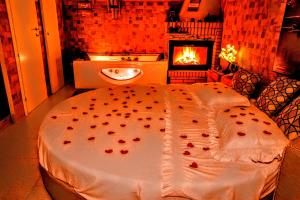 a bathroom with a cake with hearts on it at "Il Quercione" Room With SpA in Lama Di Peligni