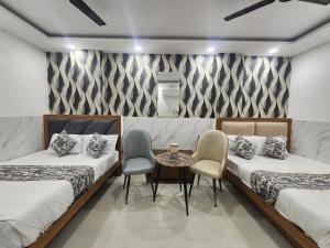 Ένα ή περισσότερα κρεβάτια σε δωμάτιο στο Hotel The Yuvaan BnB-Near New Delhi Railway +48 φωτογραφίες