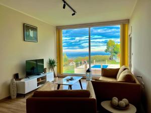 Un televizor și/sau centru de divertisment la Imanje POGLED