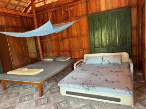 Ένα ή περισσότερα κρεβάτια σε δωμάτιο στο Nai Garden +7 φωτογραφίες