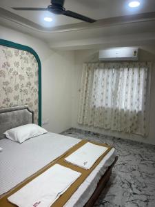 Φωτογραφία από το άλμπουμ του Hotel Radhika Grand σε Kārdha