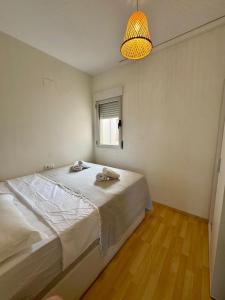 Postel nebo postele na pokoji v ubytování Casas349h Santa Teresa Campello