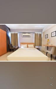 Ένα ή περισσότερα κρεβάτια σε δωμάτιο στο Hotel me-casa inn