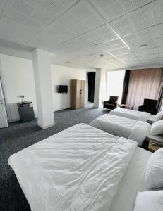 Ένα ή περισσότερα κρεβάτια σε δωμάτιο στο Hotel Midyat