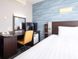 Postel nebo postele na pokoji v ubytování Comfort Hotel Tokyo Kiyosumi Shirakawa