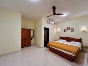 Postel nebo postele na pokoji v ubytování PALM VISTA HOMESTAY + 16 fotografií