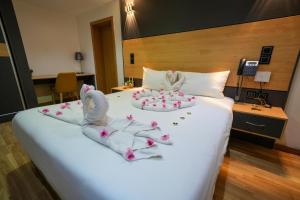 Postel nebo postele na pokoji v ubytování Sabah Resort Nouakchott