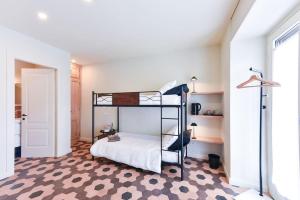 Ένα ή περισσότερα κρεβάτια σε δωμάτιο στο Libera Vite