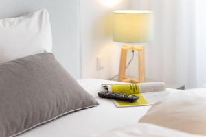 Ένα ή περισσότερα κρεβάτια σε δωμάτιο στο Carl.22 City Appartements