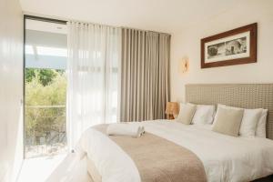 Postel nebo postele na pokoji v ubytování Villa the Cherry + 69 fotografií