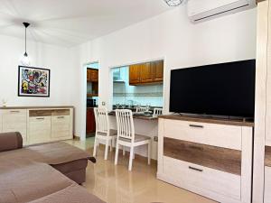 Et tv og/eller underholdning på Atlantico Apartment + 30 billeder