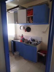 Η κουζίνα ή μικρή κουζίνα στο Northwood apartments