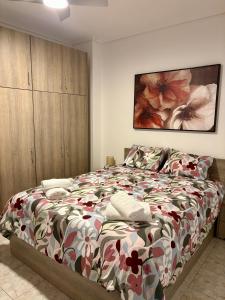 Postel nebo postele na pokoji v ubytování Domus Philippou Tsimiski II, center of Thessaloniki