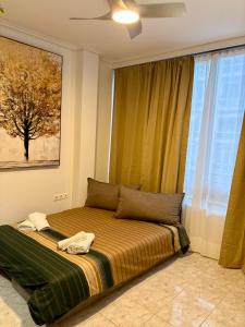 Ένα ή περισσότερα κρεβάτια σε δωμάτιο στο Domus Philippou Tsimiski II, center of Thessaloniki