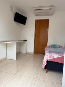 TV/trung tâm giải trí tại Quarto Ágape +4 ảnh