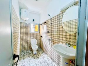 Koupelna v ubytování Larissa appartement + 9 fotografií