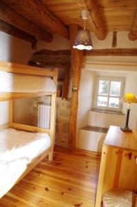 Postel nebo postele na pokoji v ubytování Aubrac de Lozère