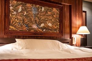 Postel nebo postele na pokoji v ubytování ホテルミント羽島 + 10 fotografií