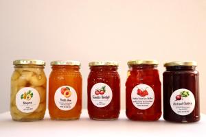 a group of four jars of pickles and jam at Grünau Chalets in Khomas Region