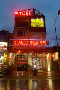 a building with a sign that reads khashachi sanctorimo at 999 Hotel Lào Cai in Yên Bái +28 photos