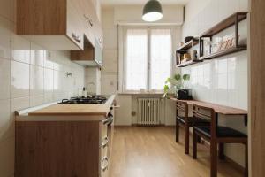 Nhà bếp/bếp nhỏ tại Tra le case di Reggio - Pisacane +6 ảnh