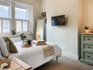 Una televisión o centro de entretenimiento en Ardbeg 10 fotos más