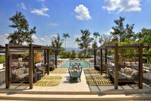 a playground at a theme park with a pool at Mövenpick Kigali in Kigali